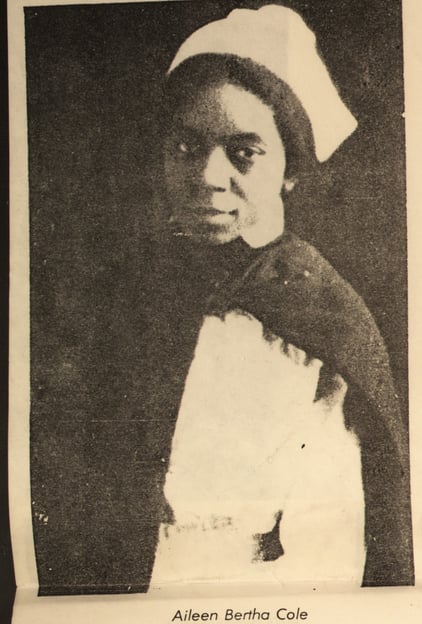 Black and white newspaper photo of Aileen Bertha Stewart in her nurse uniform