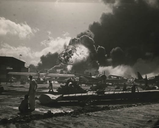 Original caption reads: wreckage-strewn Naval Air Station at Pearl Harbor following one of the Japanese sneak attacks.