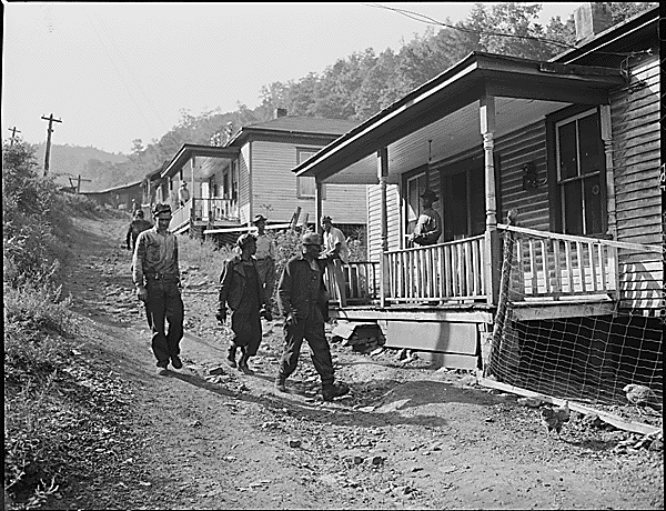 Miners coming home from morning shift. Mullens Smokeless Coal Company, Mullens Mine, Harmco, Wyoming County, West Virginia. National Archives Identifier 541333
