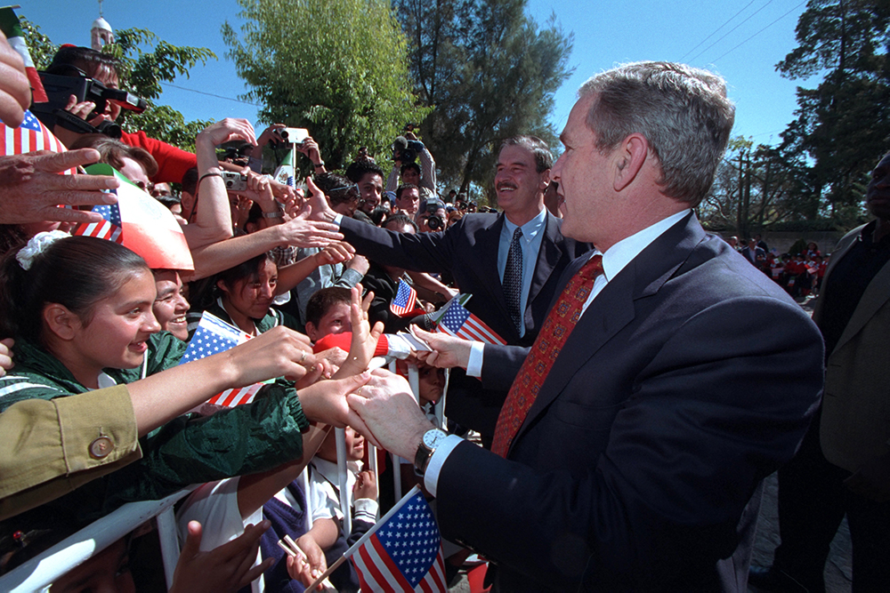 President George W. Bush and President Vicente Fox Greet Spectators