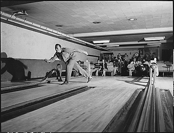 George Fain, son of Harry Fain, coal loader, bowling. There are 4 alleys in recreation center. Inland Steel Company, Wheelwright #1 & 2 Mines, Wheelwright, Floyd County, Kentucky. National Archives Identifier 541501