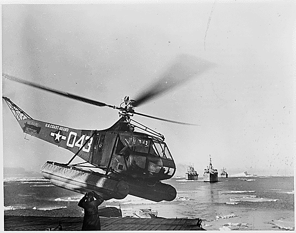helicopterUS Navy Antarctic Expedition Helicopter returns from survey of South Pole waters. The Coast Guard helicopter is shown landing on the icebreaker Northwind. In the distance are other ships of Task Force 68.