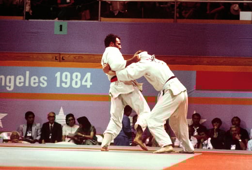 Army Captain Leo White, left, competes in a judo match during the 1984 Summer Olympics, National Archives Identifier 6386494