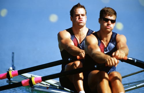 Straight on, medium shot of ENSIGN Henry Nuzum (Left) and Mike Ferry as they stroke their way toward a second place finish Tuesday, September 19th, 2000, during the semi finals or repechage of the Men's Double Sculls round in the Sydney Olympics. Nuzum and Ferry moved on to the next round of semi finals on Thursday, September 21st, 2000, National Archives Identifier 6516371