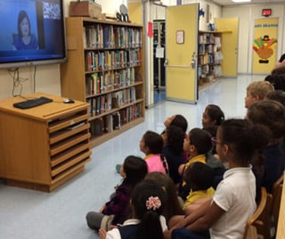 Photograph of students participating in virtual program